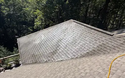 Asphalt shingle roof soft washing partway blowing rock