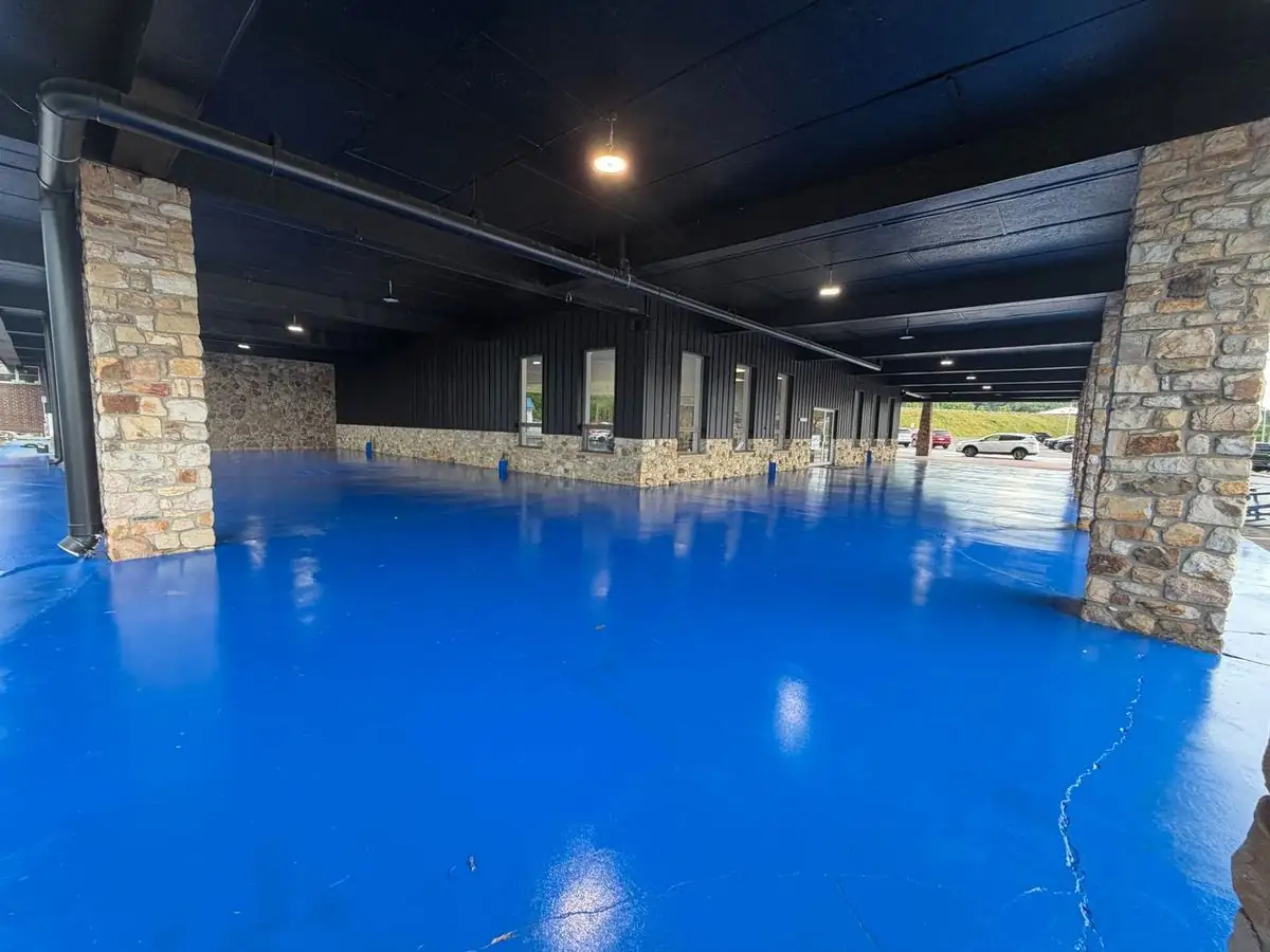 Glossy blue coated concrete floor in Boone