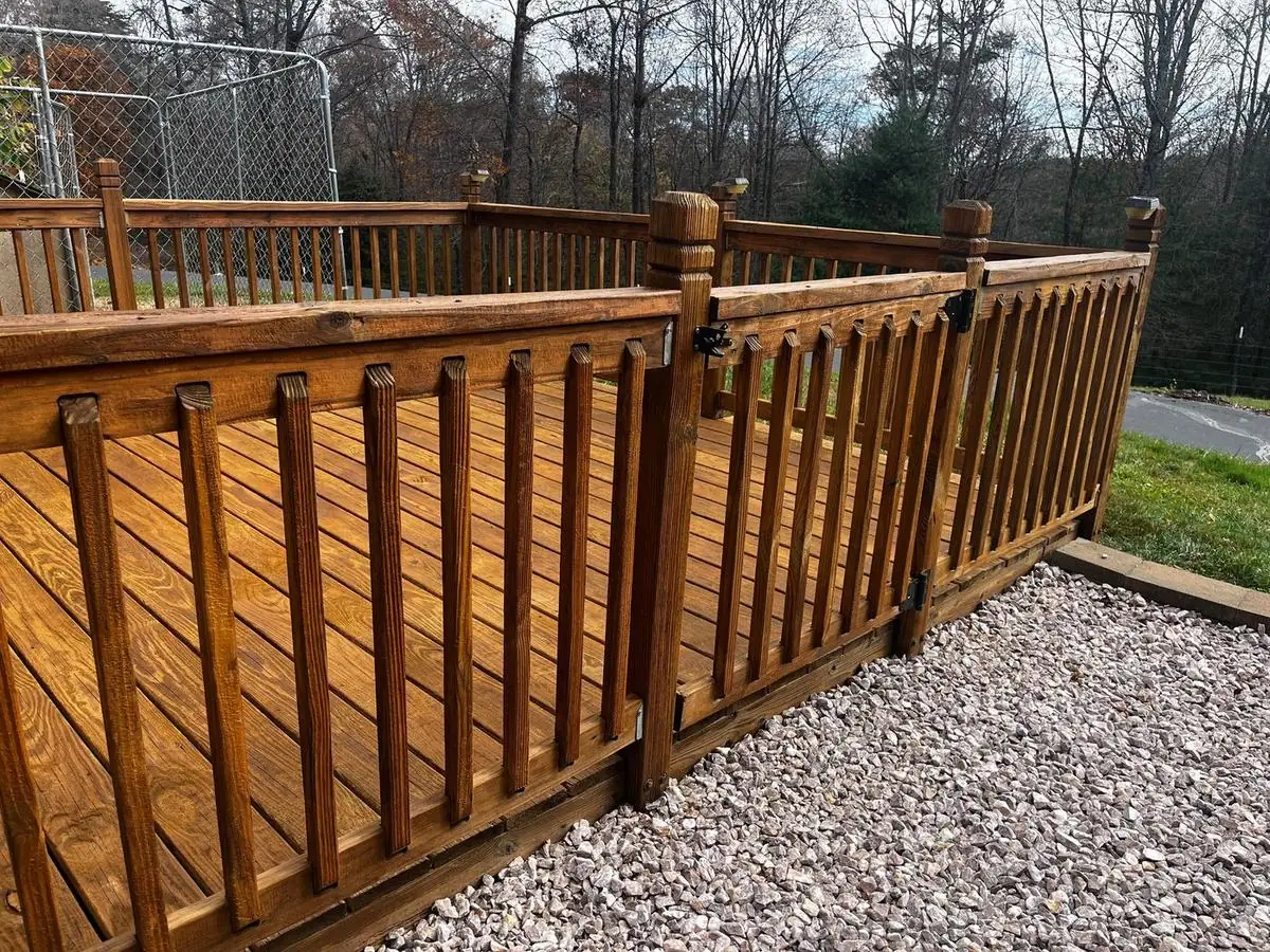 Deck and railing after cleaning and staining in North Wilkesboro