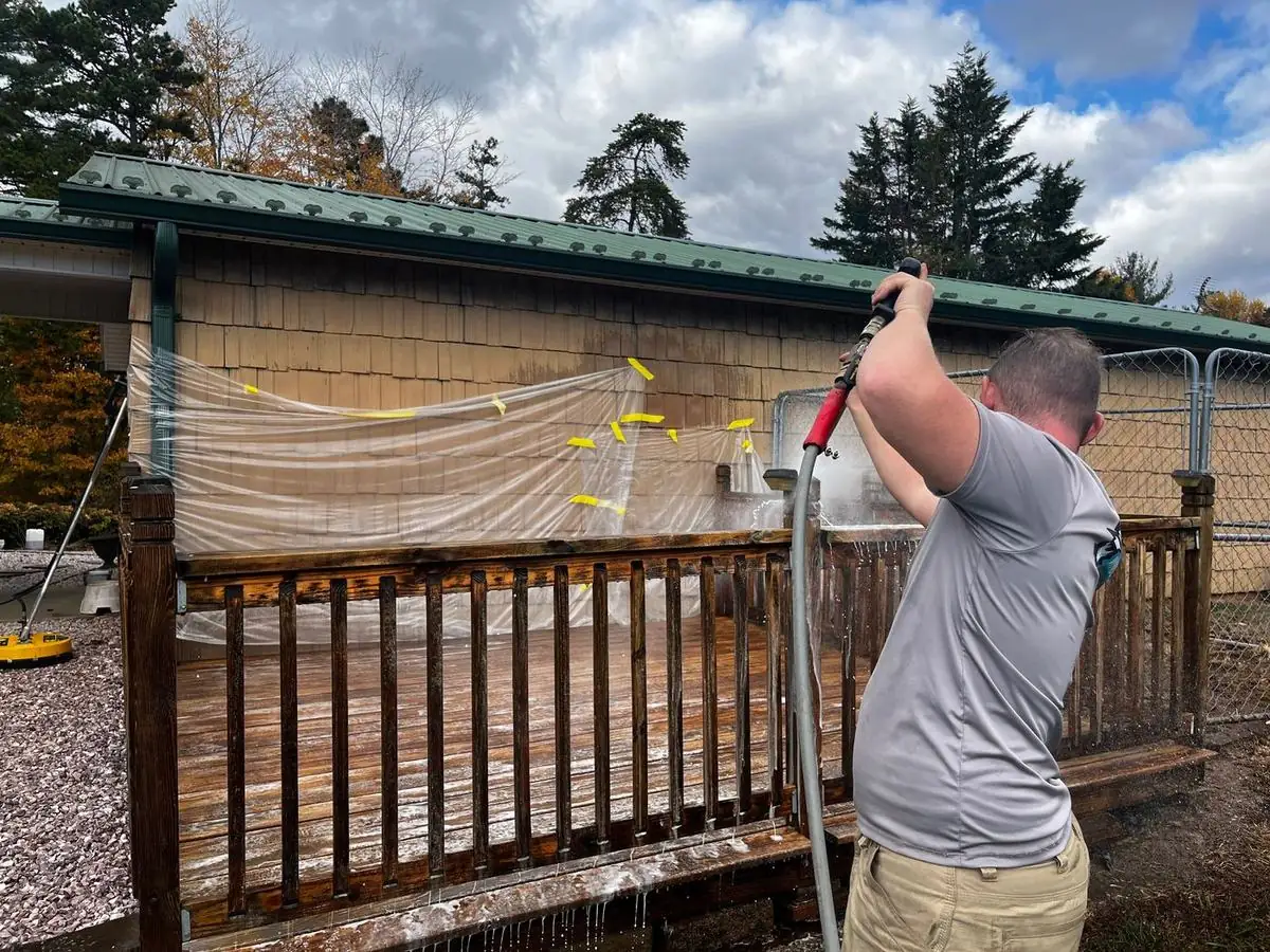 Deck and railing being cleaned before staining in North Wilkesboro