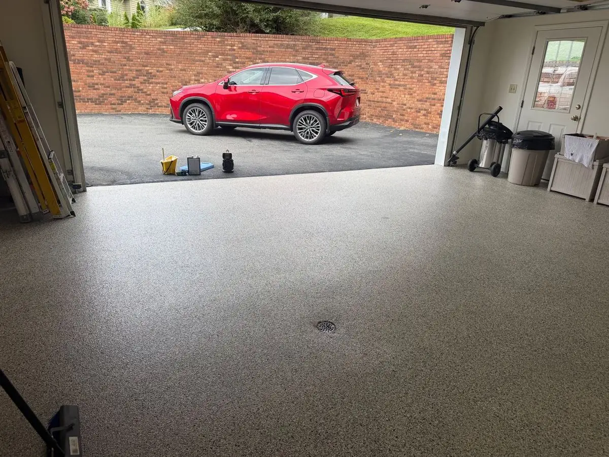 Finished full-flake epoxy floor in a two-car garage in Boone