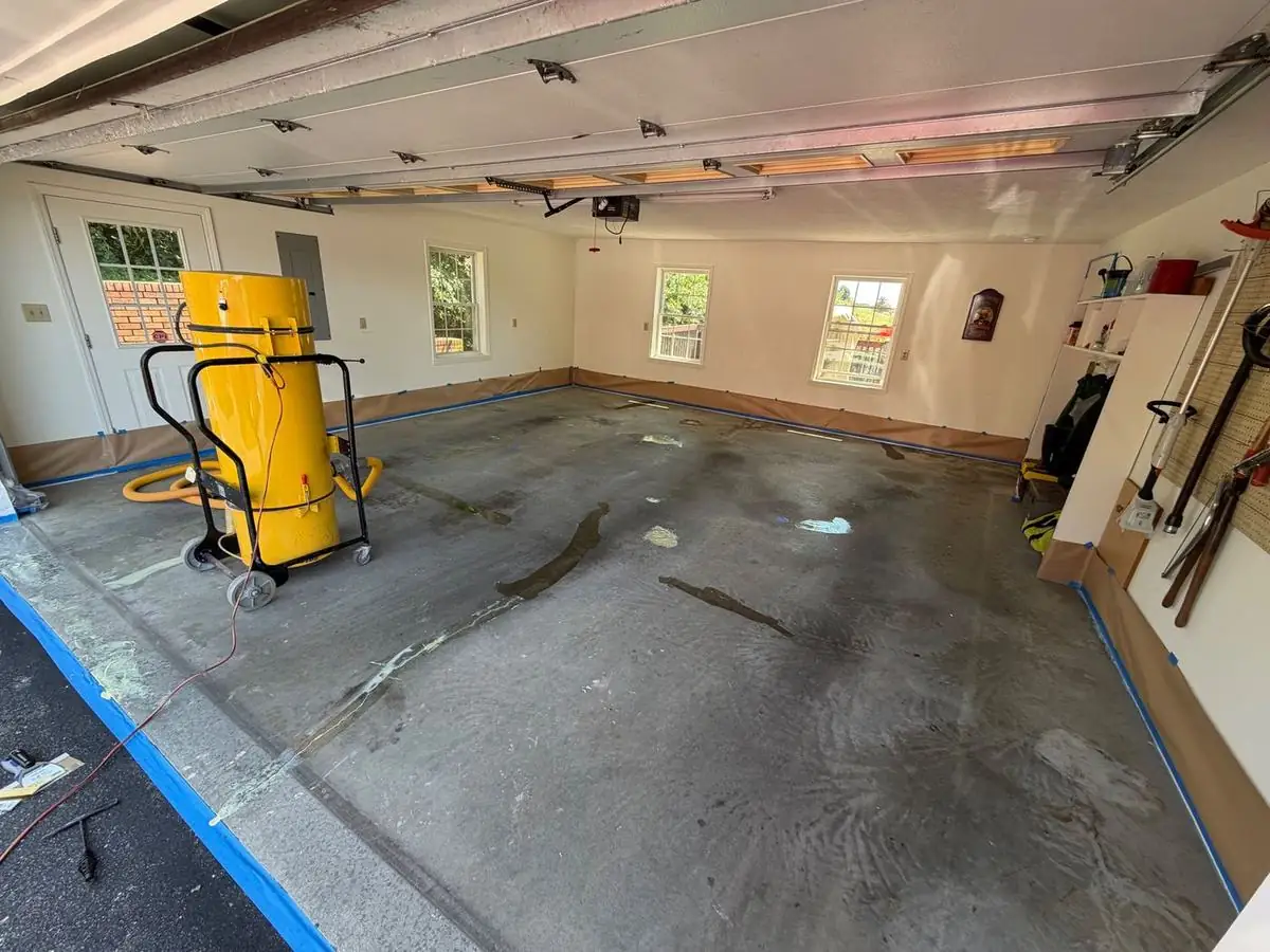 Garage floor prepped for flake epoxy in Boone