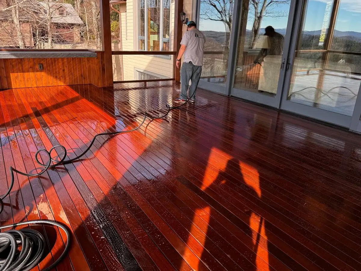Ipe deck being rinsed after cleaning