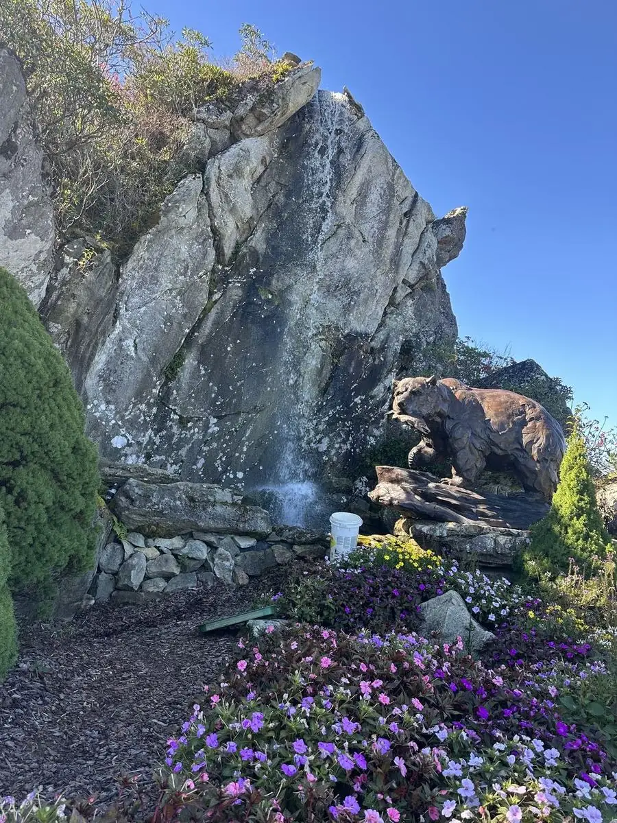 Rock waterfall before cleaning at Linville Ridge in Linville