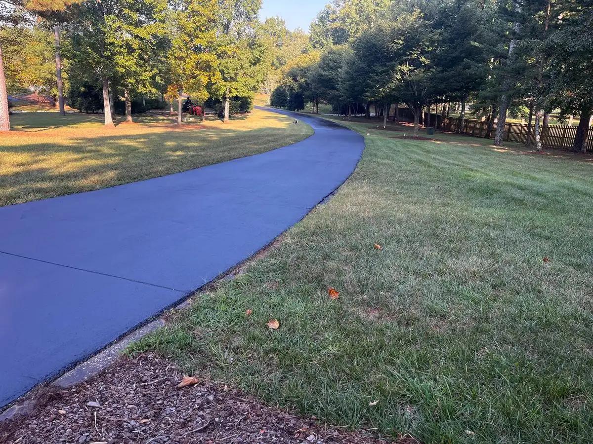 Freshly sealed asphalt driveway