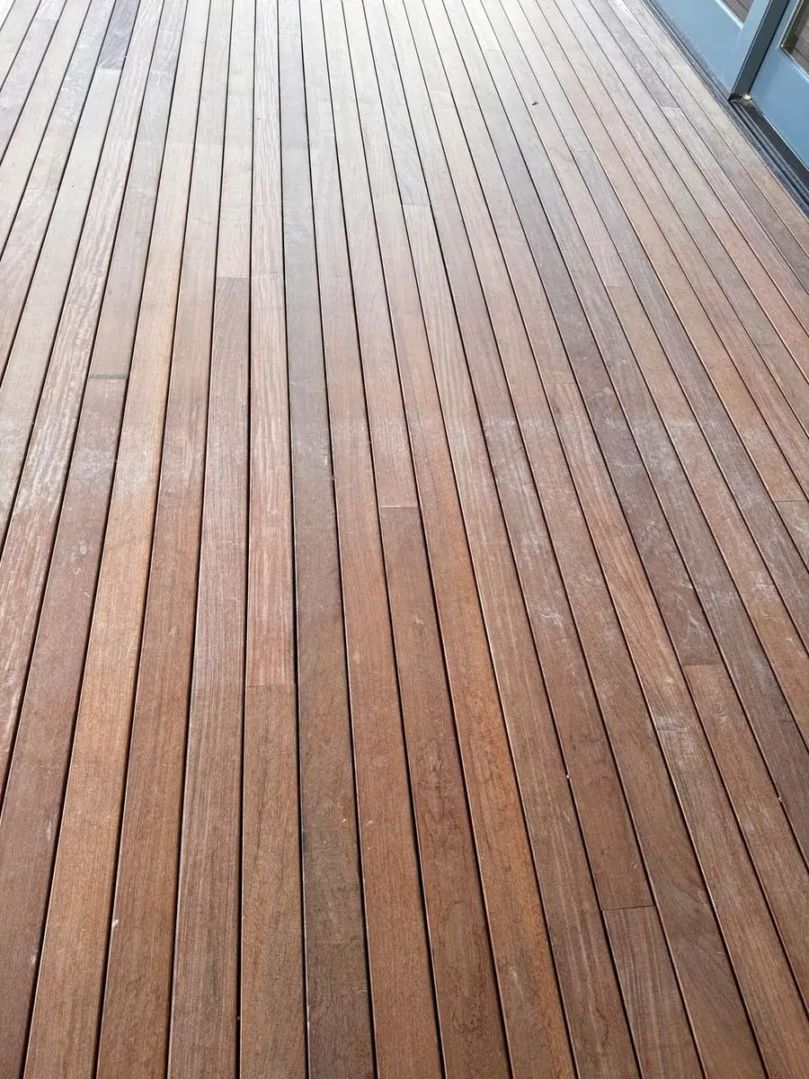 Weathered ipe deck before restoration