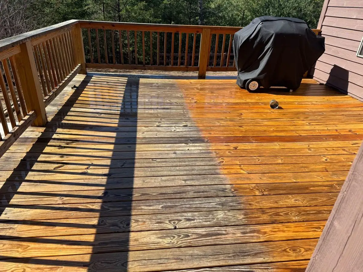Wood deck half cleaned